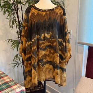 Brown Sleeveless Top as an undergarment to this Beautifully Designed Tunic Top